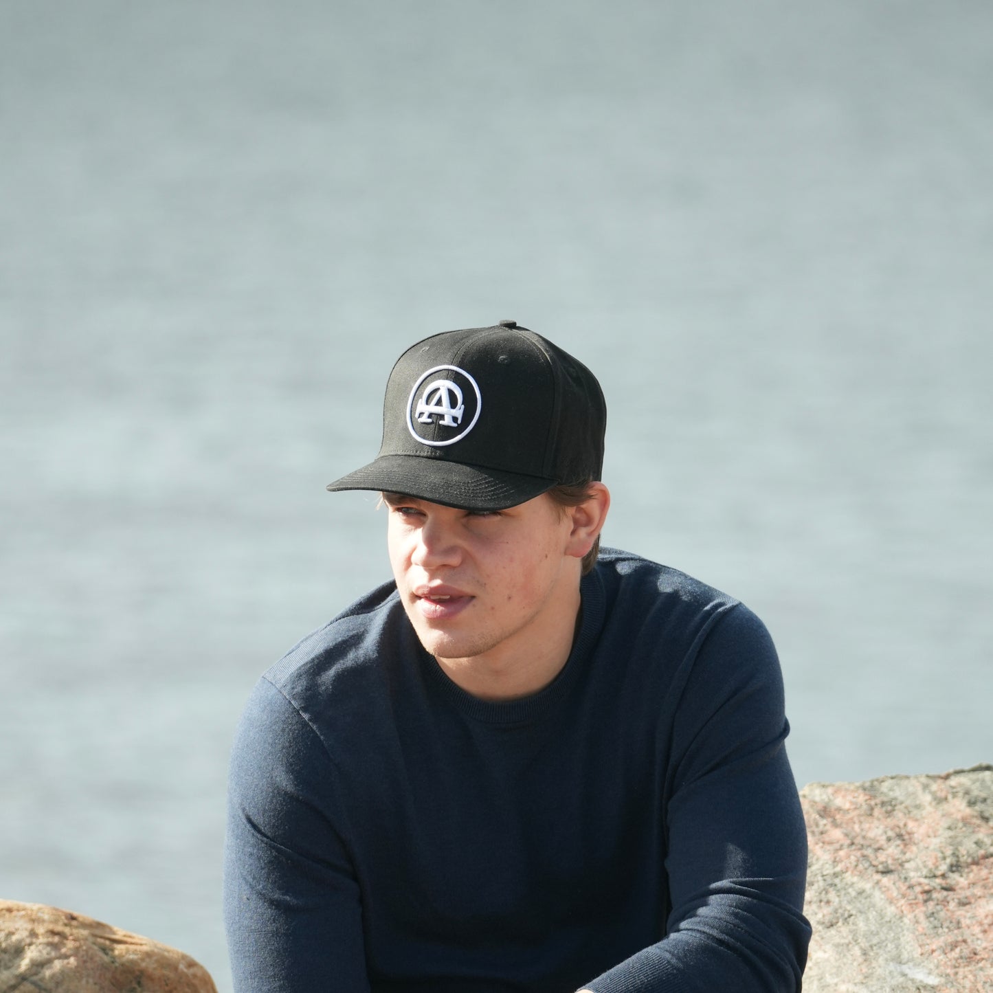 The black baseball cap